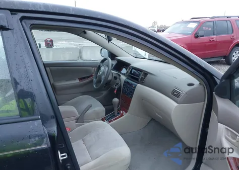 2005 Toyota Corolla Le z USA, uszkodzony, nr VIN 2T1BR30E65C396704